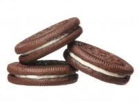 Chocolate cookies with cream filling isolated