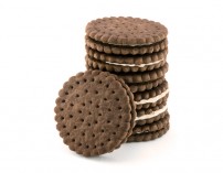 Pile of chocolate cream cookies isolated on white